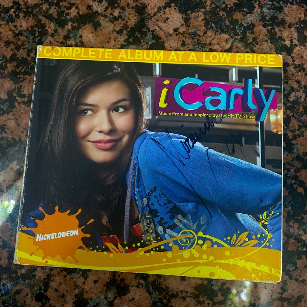 Miranda Cosgrove Signed Album Cover